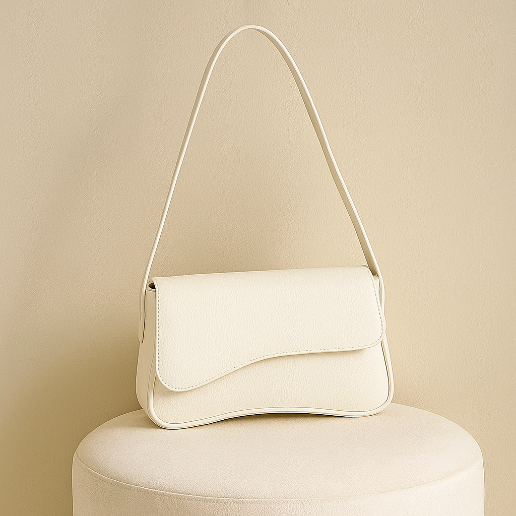 Bolsa transversal MOODS com formas irregulares.