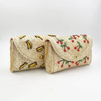 Bolsa Feminina de Palha Rígida com Detalhes Florais e Estampa Frutada.